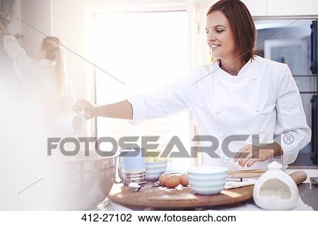 Chef baking in kitchen View Large Photo Image Stock Image - Chef baking in kitchen. Fotosearch
