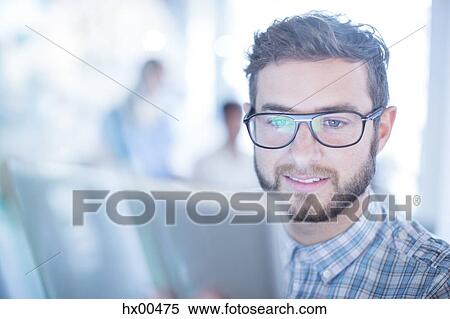 Close up businessman with eyeglasses using digital tablet View Large Photo Image Stock Photography - Close up businessman with eyeglasses using digital tablet. Fotosearch