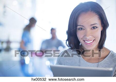 Close up portrait confident businesswoman with digital tablet View Large Photo Image Stock Image - Close up portrait confident businesswoman with digital tablet. Fotosearch