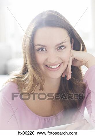 Close up portrait smiling brunette woman View Large Photo Image Stock Image - Close up portrait smiling brunette woman. Fotosearch