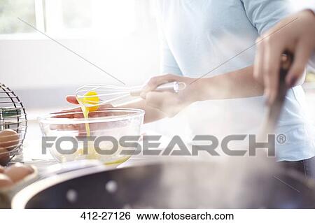 Close up women baking in kitchen View Large Photo Image Stock Photograph - Close up women baking in kitchen. Fotosearch