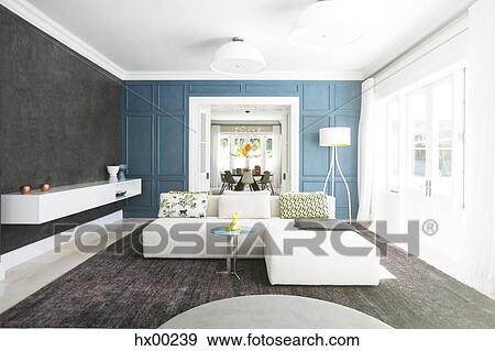 Stock Photo - Home showcase living room with chaise sofa. Fotosearch