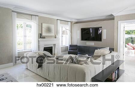 Home showcase living room with sectional sofa View Large Photo Image Stock Image - Home showcase living room with sectional sofa. Fotosearch