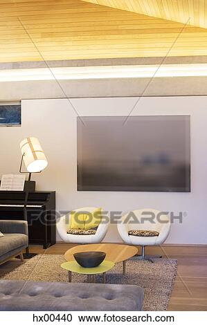 Stock Image - Illuminated living room. Fotosearch