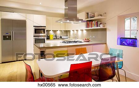 Modern kitchen and dining table View Large Photo Image Stock Photography - Modern kitchen and dining table. Fotosearch