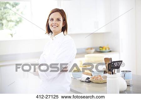 Stock Photography - Portrait confident chef in kitchen. Fotosearch