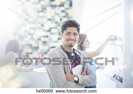 Stock Image - Portrait confident creative businessman in office. Fotosearch