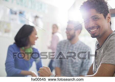 Portrait confident creative businessman in meeting View Large Photo Image Stock Photography - Portrait confident creative businessman in meeting. Fotosearch