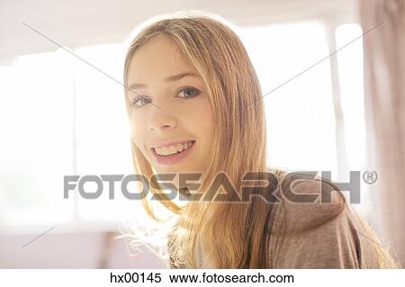 Stock Photography - Portrait smiling blonde teenage girl. Fotosearch