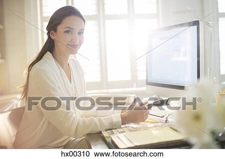 Portrait smiling interior designer with swatches at computer in home office View Large Photo Image Stock Image - Portrait smiling interior designer with swatches at computer in home office. Fotosearch