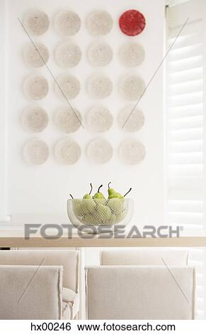 Red plate among white plates on wall in luxury dining room View Large Photo Image Stock Photograph - Red plate among white plates on wall in luxury dining room. Fotosearch