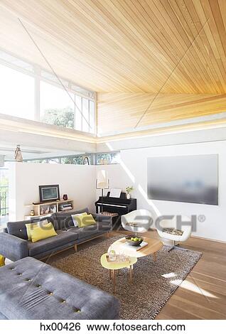 Slanted wood ceiling over living room View Large Photo Image Stock Photograph - Slanted wood ceiling over living room. Fotosearch