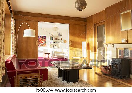 Sunny wood paneled living room View Large Photo Image Picture - Sunny wood paneled living room. Fotosearch