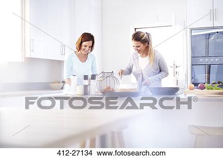 Women baking in kitchen View Large Photo Image Picture - Women baking in kitchen. Fotosearch
