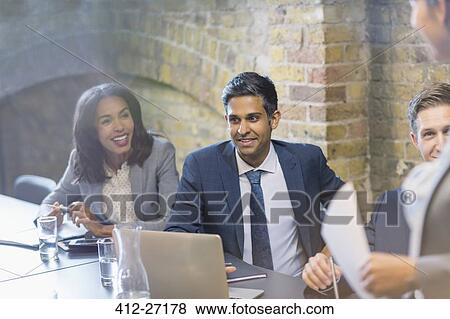 Business people in conference room meeting View Large Photo Image Stock Photo - Business people in conference room meeting. Fotosearch