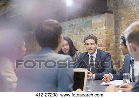 Business people talking in conference room meeting View Large Photo Image Stock Photo - Business people talking in conference room meeting. Fotosearch