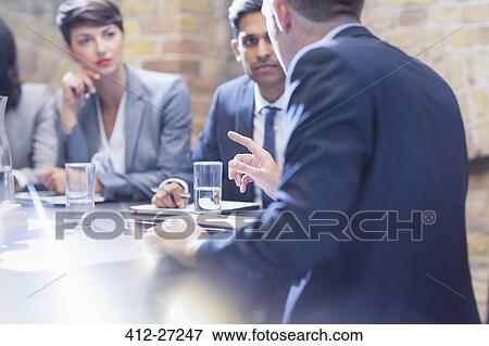 Business people talking in conference room meeting View Large Photo Image Stock Photo - Business people talking in conference room meeting. Fotosearch