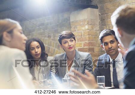 Business people talking in conference room meeting View Large Photo Image Stock Photograph - Business people talking in conference room meeting. Fotosearch