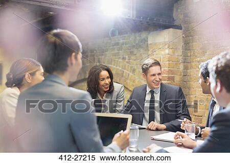 Business people talking in conference room meeting View Large Photo Image Stock Photography - Business people talking in conference room meeting. Fotosearch