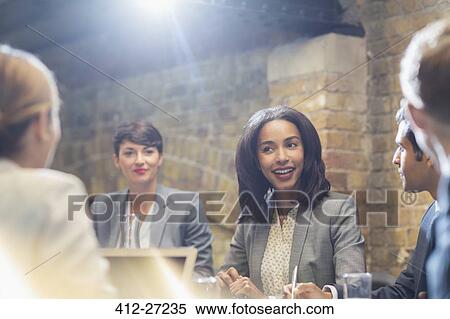Business people talking in conference room meeting View Large Photo Image Stock Photography - Business people talking in conference room meeting. Fotosearch