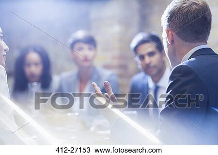 Business people talking in meeting View Large Photo Image Stock Image - Business people talking in meeting. Fotosearch
