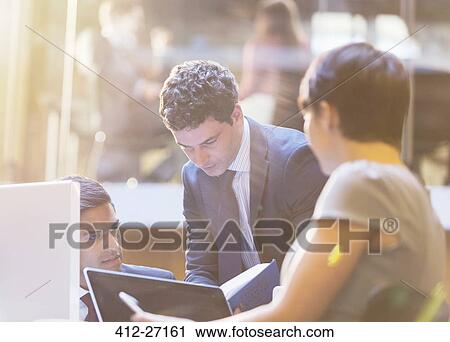 Business people working in meeting View Large Photo Image Stock Image - Business people working in meeting. Fotosearch