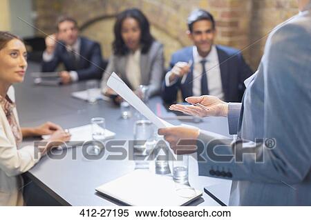 Businesswoman leading meeting in conference room View Large Photo Image Stock Photography - Businesswoman leading meeting in conference room. Fotosearch