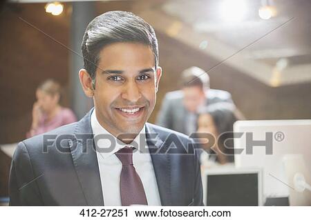 Stock Image - Close up portrait smiling businessman. Fotosearch