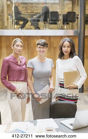 Stock Image - Portrait confident businesswomen in office. Fotosearch
