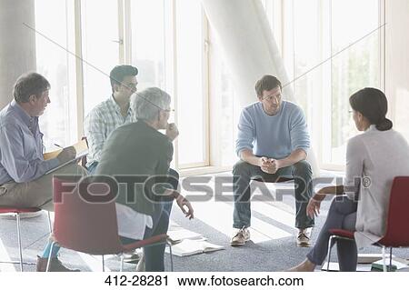 Business people talking in meeting View Large Photo Image Stock Image - Business people talking in meeting. Fotosearch