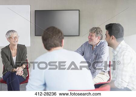 Business people talking in meeting View Large Photo Image Stock Photograph - Business people talking in meeting. Fotosearch