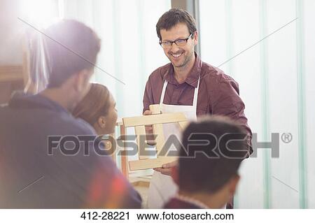 Carpentry teacher leading lesson in workshop View Large Photo Image Stock Image - Carpentry teacher leading lesson in workshop. Fotosearch