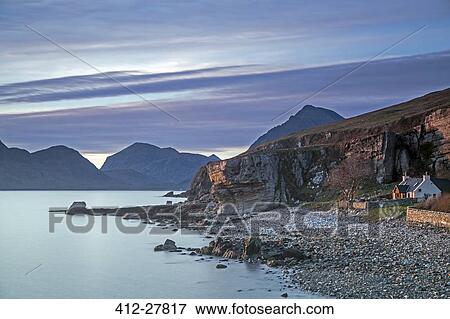 Stock Photo - House on remote beach among cliffs, Elgol, Skye, Scotland. Fotosearch