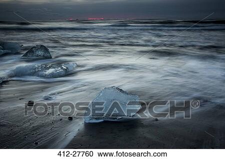 Ice on stormy cold ocean beach, Iceland View Large Photo Image Stock Image - Ice on stormy cold ocean beach, Iceland. Fotosearch