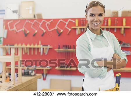 Portrait confident carpenter in workshop View Large Photo Image Stock Photo - Portrait confident carpenter in workshop. Fotosearch