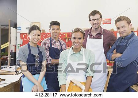 Portrait confident carpenters in workshop View Large Photo Image Stock Photo - Portrait confident carpenters in workshop. Fotosearch