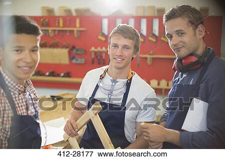 Portrait confident carpenters in workshop View Large Photo Image Stock Photo - Portrait confident carpenters in workshop. Fotosearch