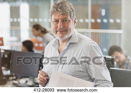 Portrait confident man in adult education computer classroom View Large Photo Image Stock Image - Portrait confident man in adult education computer classroom. Fotosearch