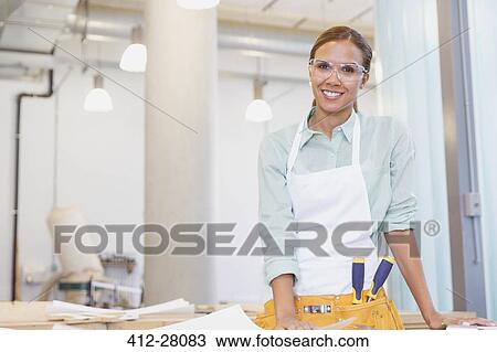 Portrait smiling carpenter in workshop View Large Photo Image Stock Image - Portrait smiling carpenter in workshop. Fotosearch