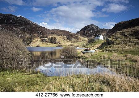 Scenic view of sunny remote lake and rural landscape, Scotland View Large Photo Image Stock Photograph - Scenic view of sunny remote lake and rural landscape, Scotland. Fotosearch