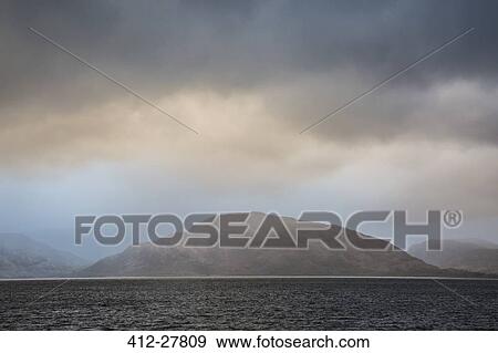 Stormy sky over craggy mountains and bay, Port Appin, Argyll Scotland View Large Photo Image Stock Photo - Stormy sky over craggy mountains and bay, Port Appin, Argyll Scotland. Fotosearch