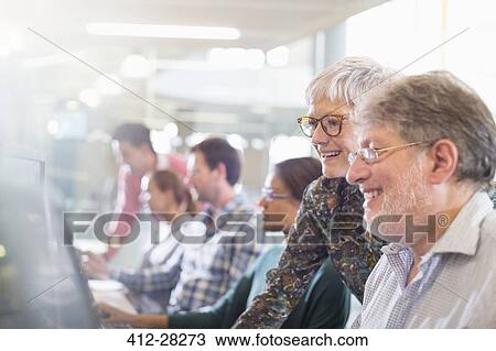 Students at computer in adult education classroom View Large Photo Image Stock Image - Students at computer in adult education classroom. Fotosearch