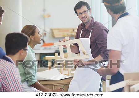 Teacher and students in adult education carpentry workshop class View Large Photo Image Stock Image - Teacher and students in adult education carpentry workshop class. Fotosearch