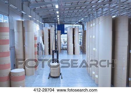 Wrapped spools of paper stacked in printing plant warehouse View Large Photo Image Picture - Wrapped spools of paper stacked in printing plant warehouse. Fotosearch