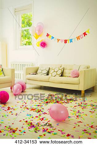 Birthday sign, balloons and confetti in living room View Large Photo Image Stock Image - Birthday sign, balloons and confetti in living room. Fotosearch