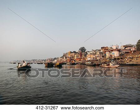 Boats on river, Varanasi, India View Large Photo Image Stock Photo - Boats on river, Varanasi, India. Fotosearch