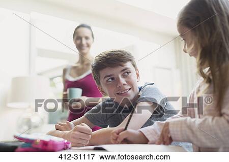 Brother and sister doing homework View Large Photo Image Stock Photo - Brother and sister doing homework. Fotosearch