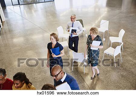 Business people leaving meeting circle View Large Photo Image Stock Photograph - Business people leaving meeting circle. Fotosearch