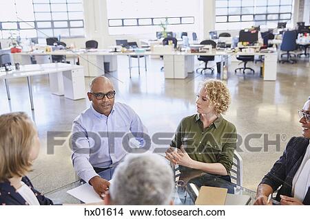 Business people talking in meeting View Large Photo Image Picture - Business people talking in meeting. Fotosearch