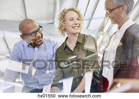 Business people talking in meeting View Large Photo Image Stock Image - Business people talking in meeting. Fotosearch